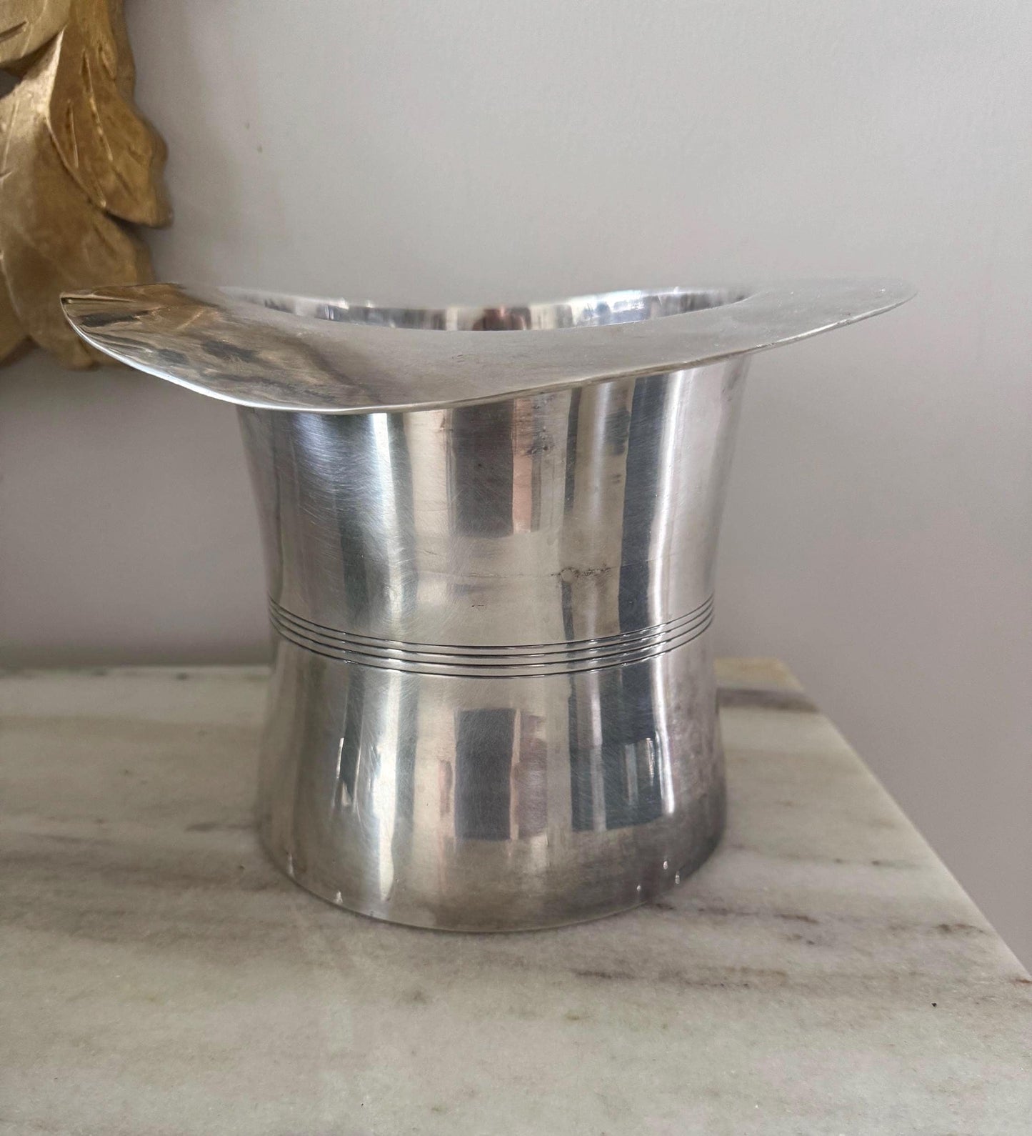 silver top hat ice bucket
champagne ice bucket