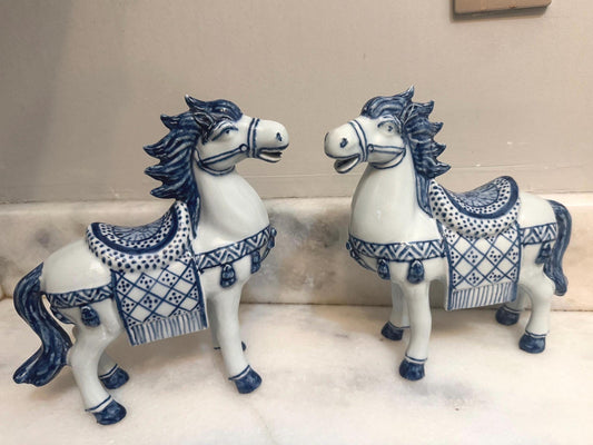 blue white horses
