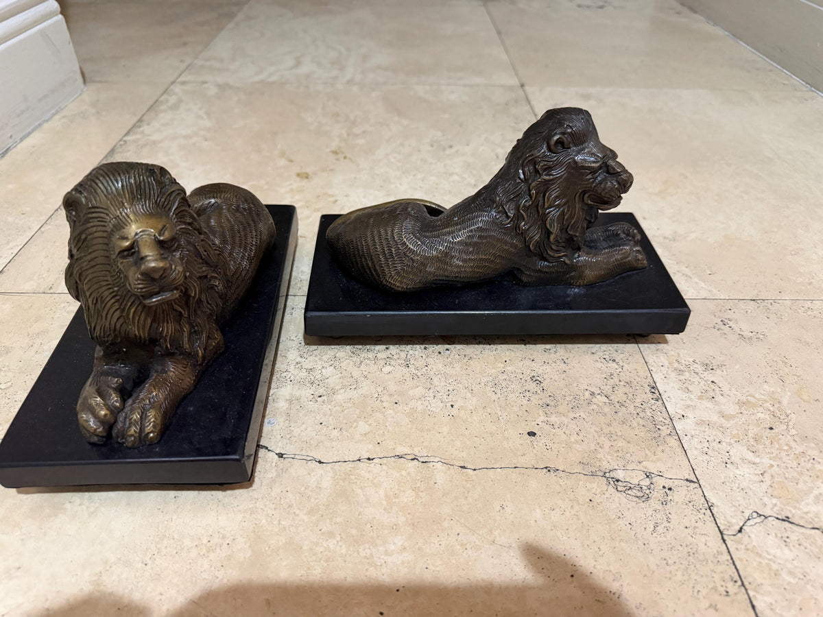 Bombay Company Lion Sculptures, Pair of Heavy Bronze-Tone Reclining Lions on Black Bases, Traditional Library Mantel Decor