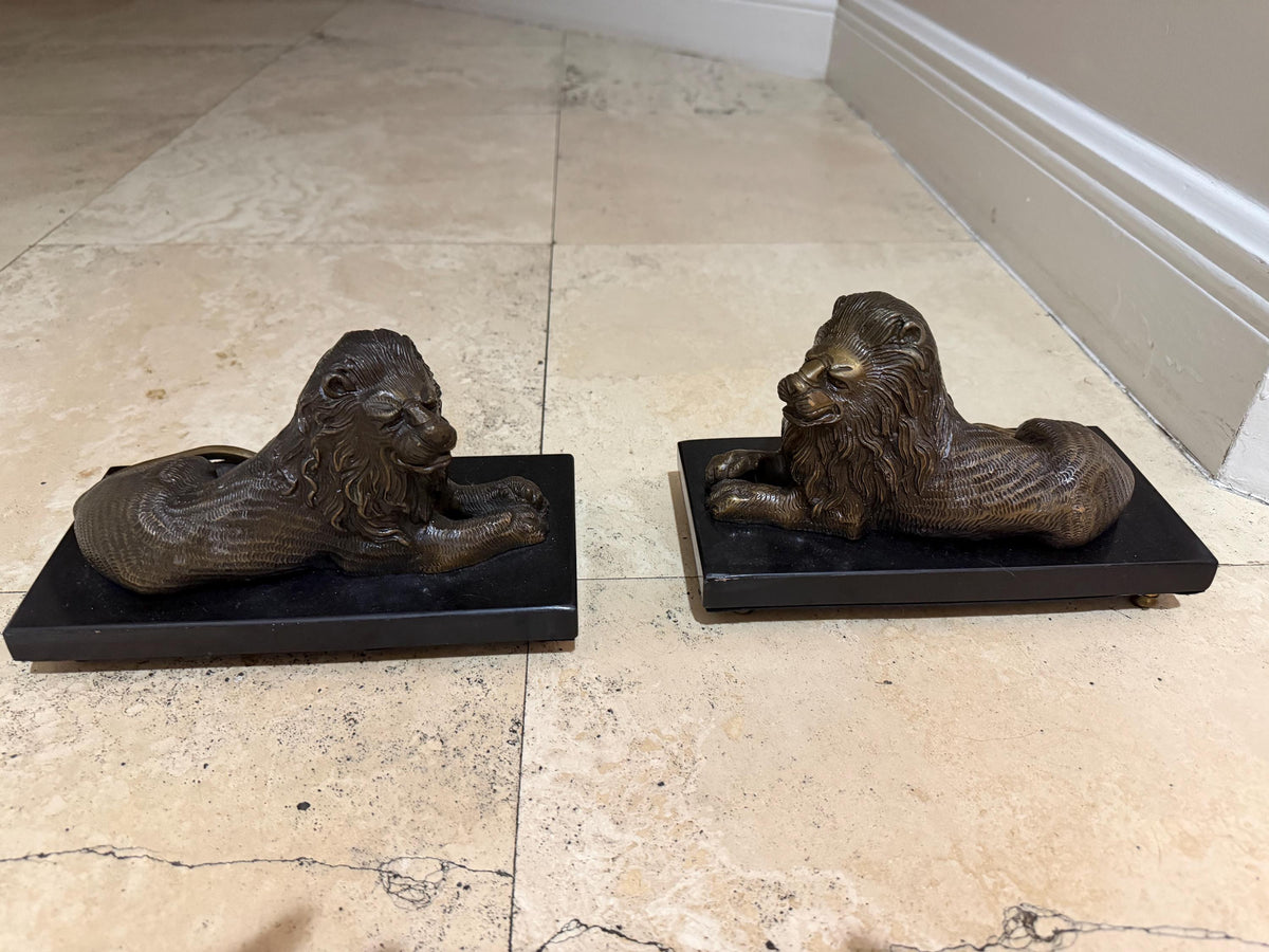 Bombay Company Lion Sculptures, Pair of Heavy Bronze-Tone Reclining Lions on Black Bases, Traditional Library Mantel Decor